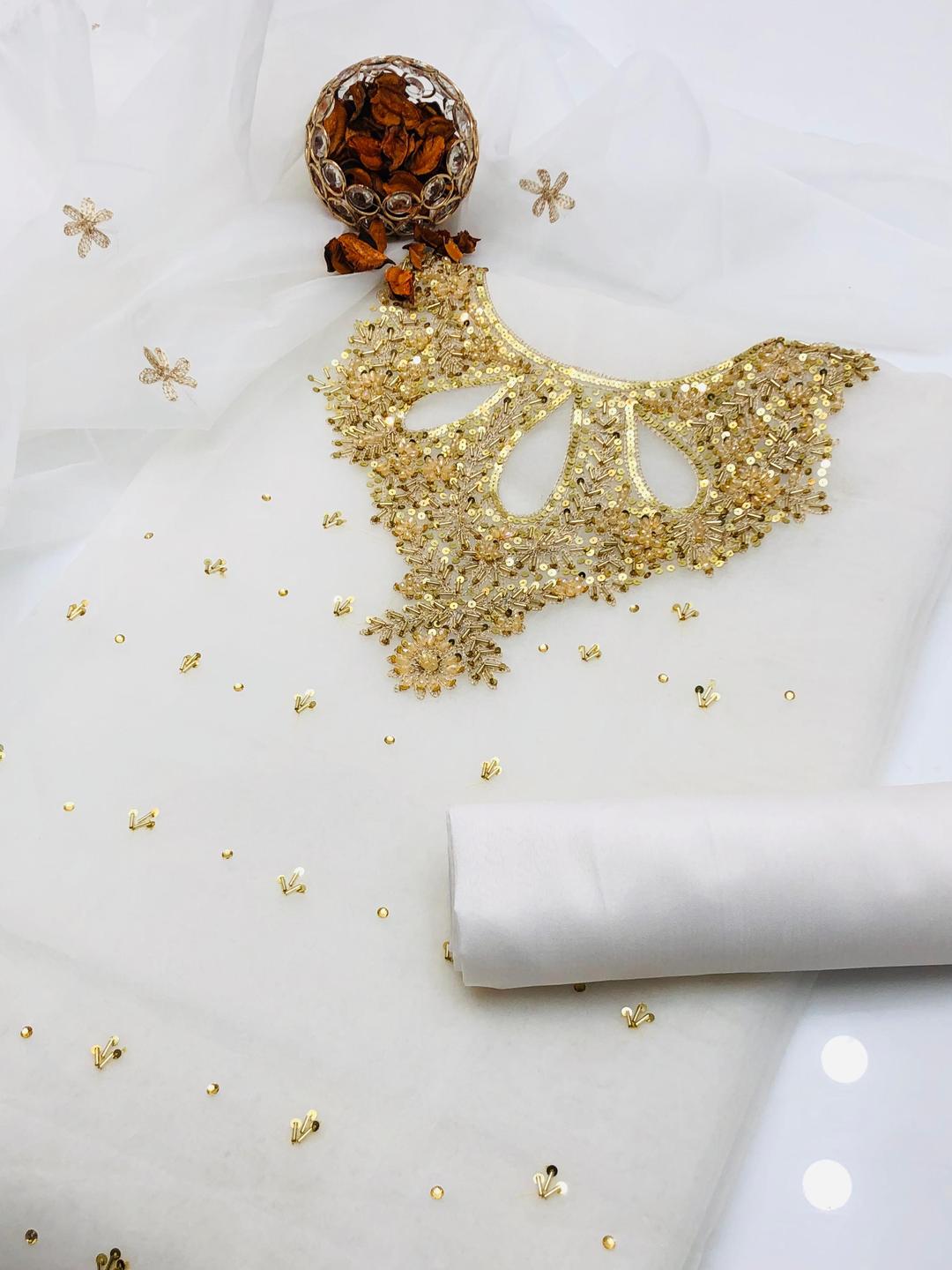 3 Pcs Women unstitched Embroidered suit.